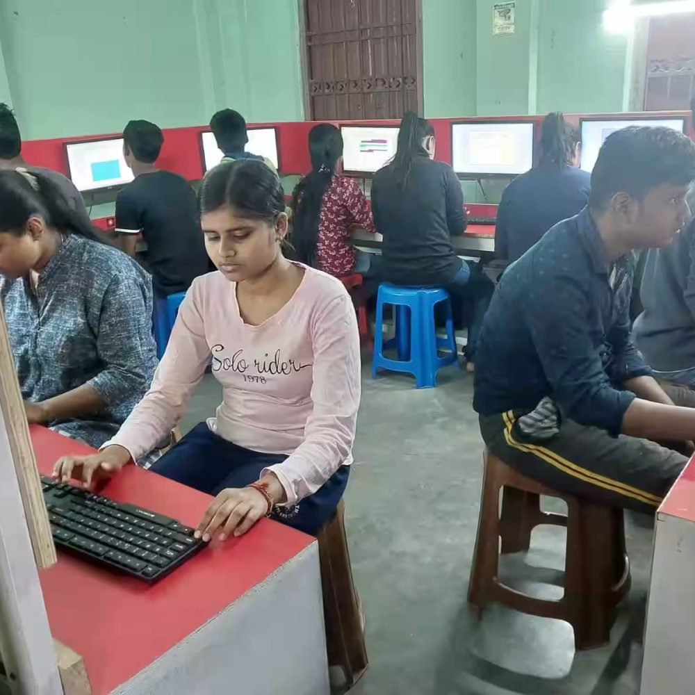 Woman working on a laptop during a digital skills session