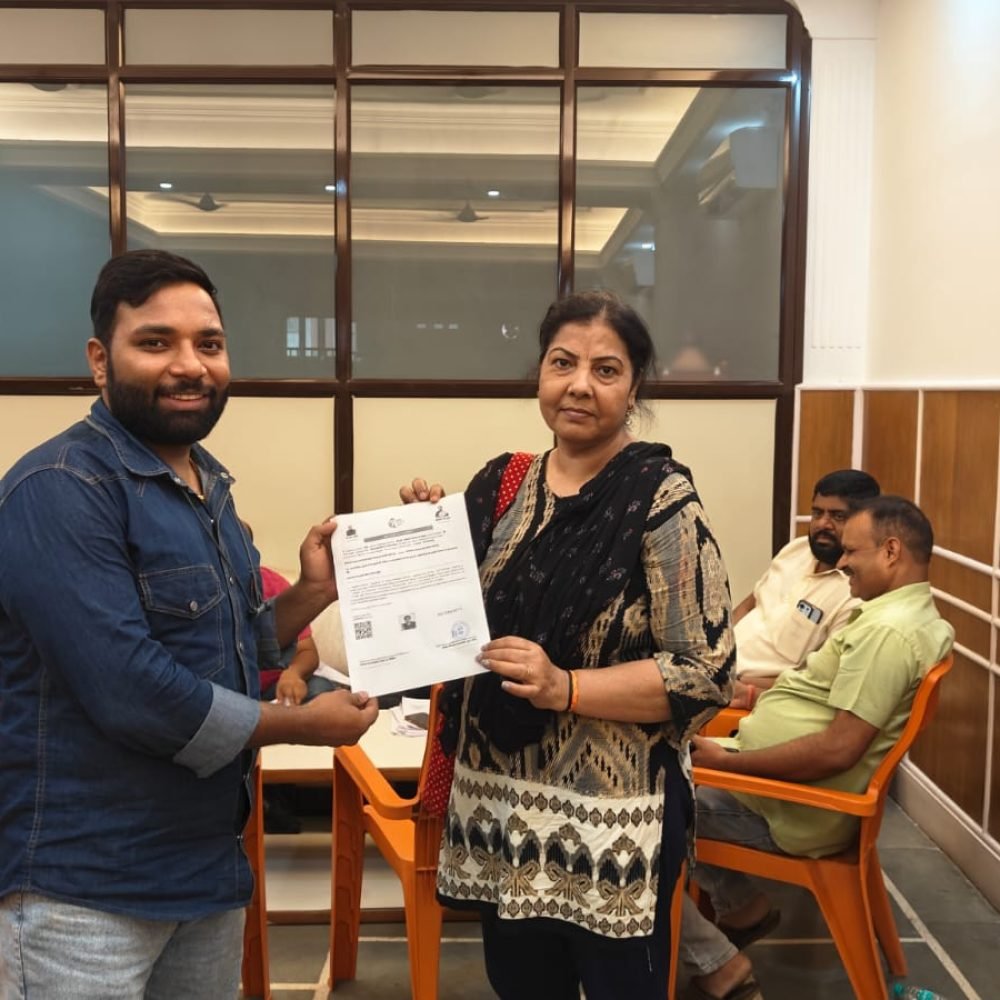 Participant receiving a certificate at a Sunil Foundation event